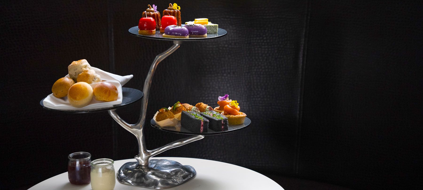 The Gallery high tea tiered stand with pastries and scones